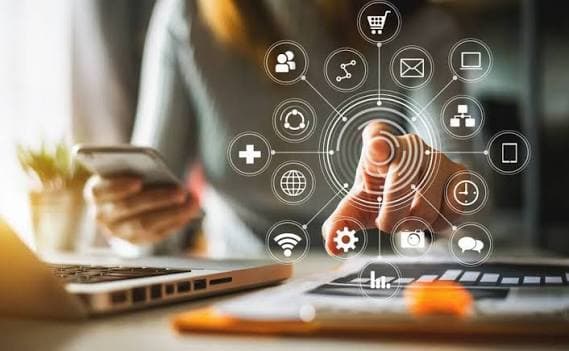 Laptop and mobile devices with connected digital workflow icons